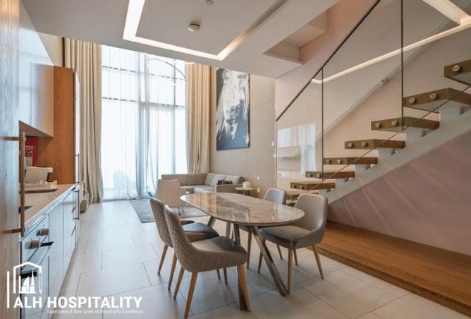 Loft one-bed at SLS Dubai — double-height ceilings